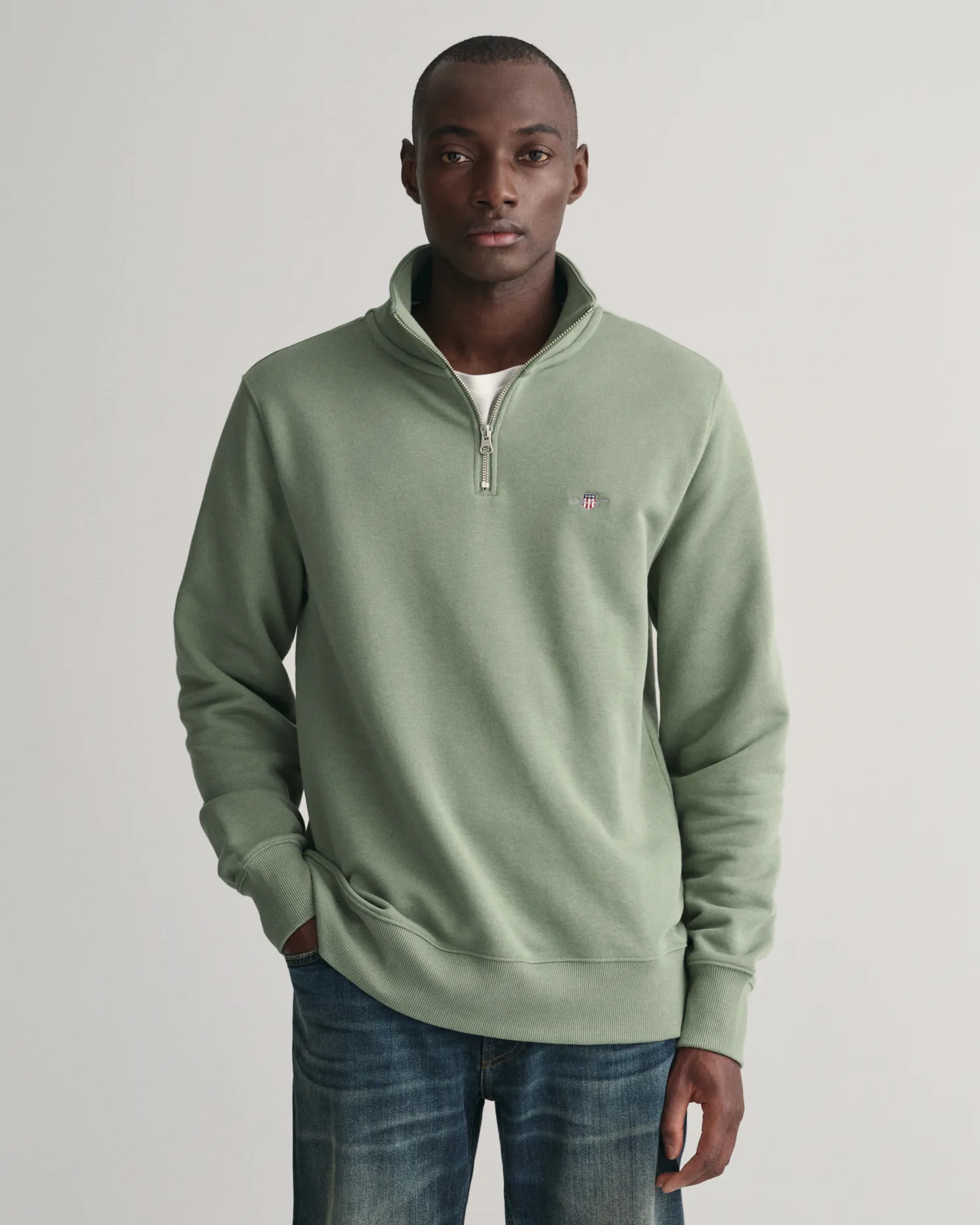 Felpa Shield con zip corta    