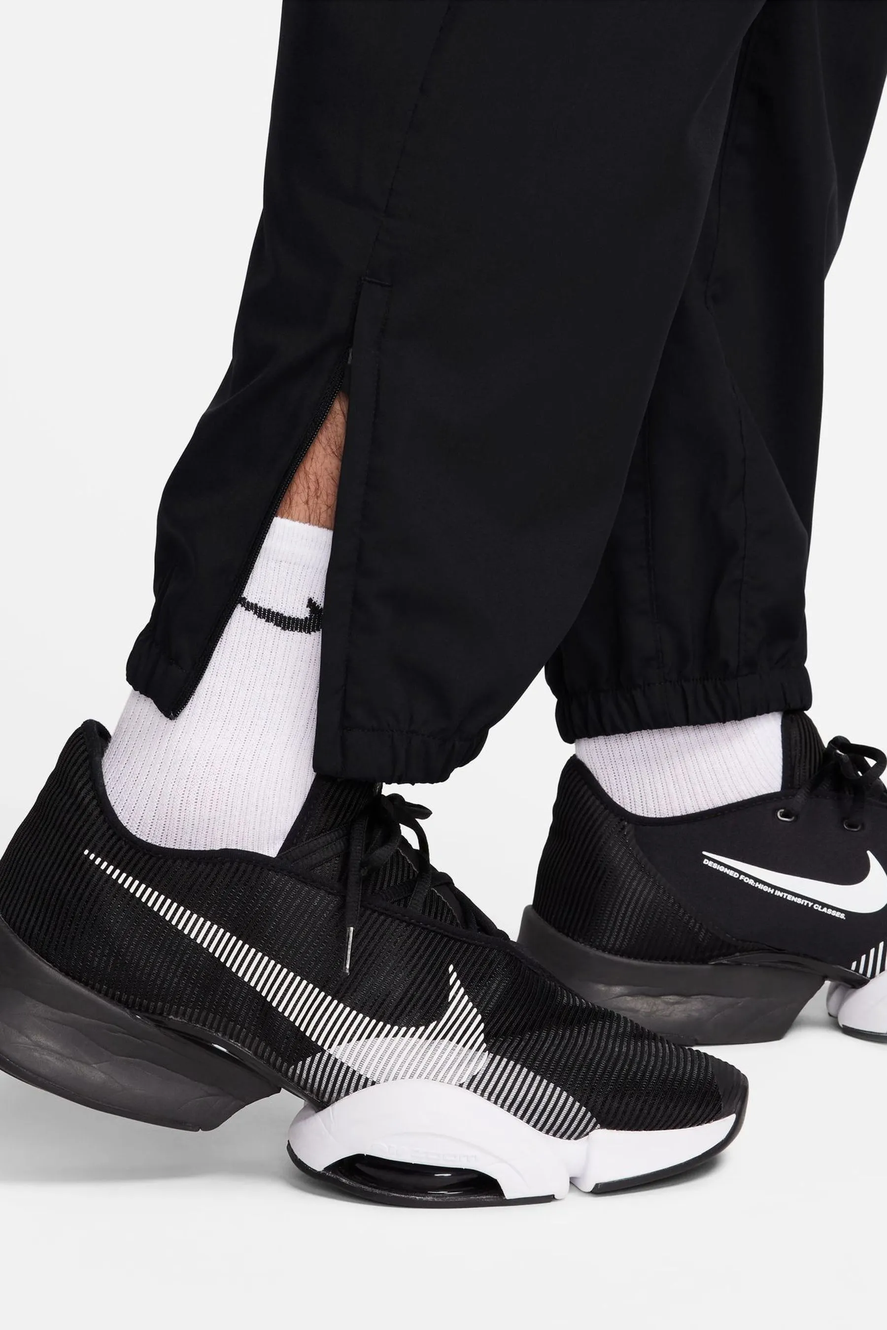 Nike - Pantaloni da jogging da allenamento Dri-FIT stretti in fondo
