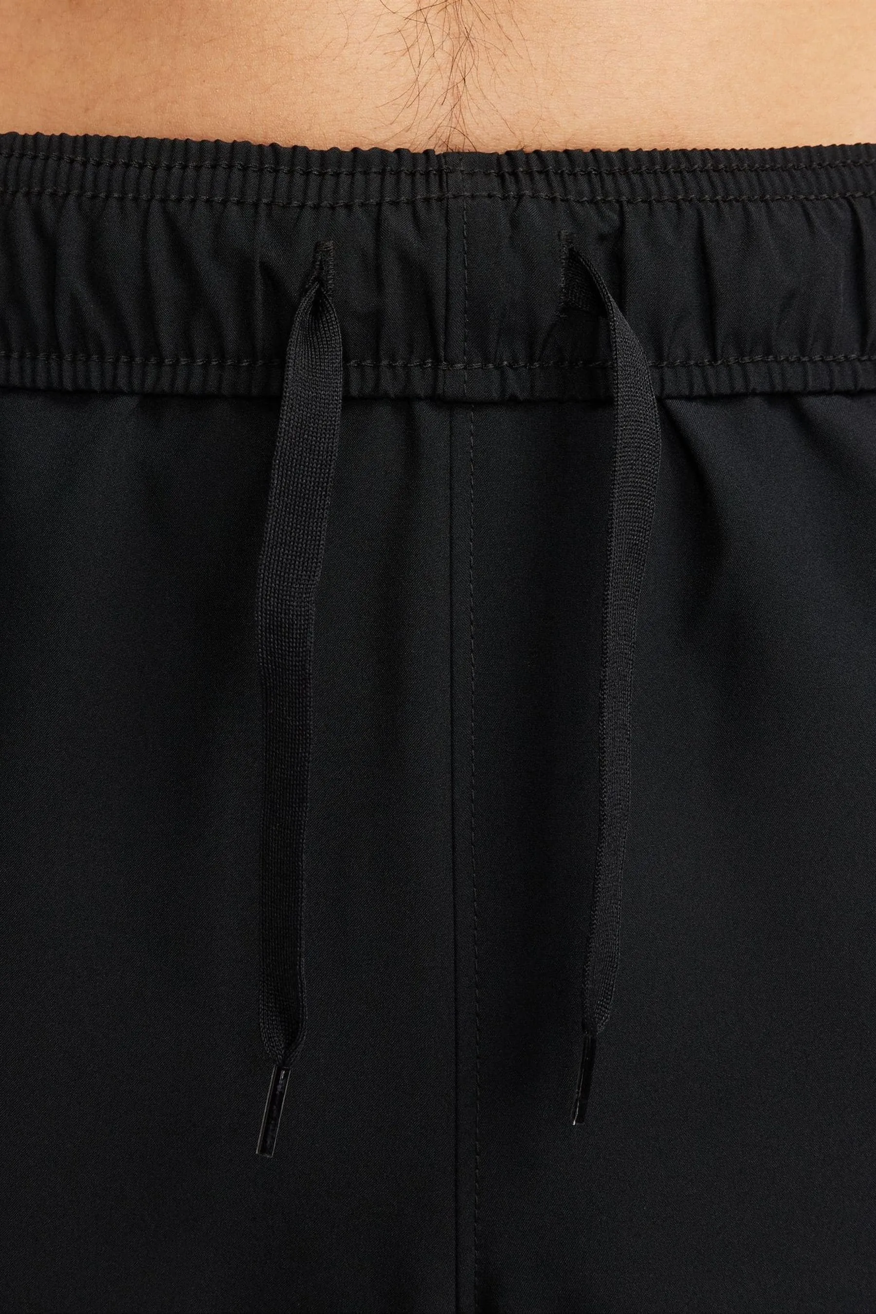 Nike - Pantaloni da jogging da allenamento Dri-FIT stretti in fondo