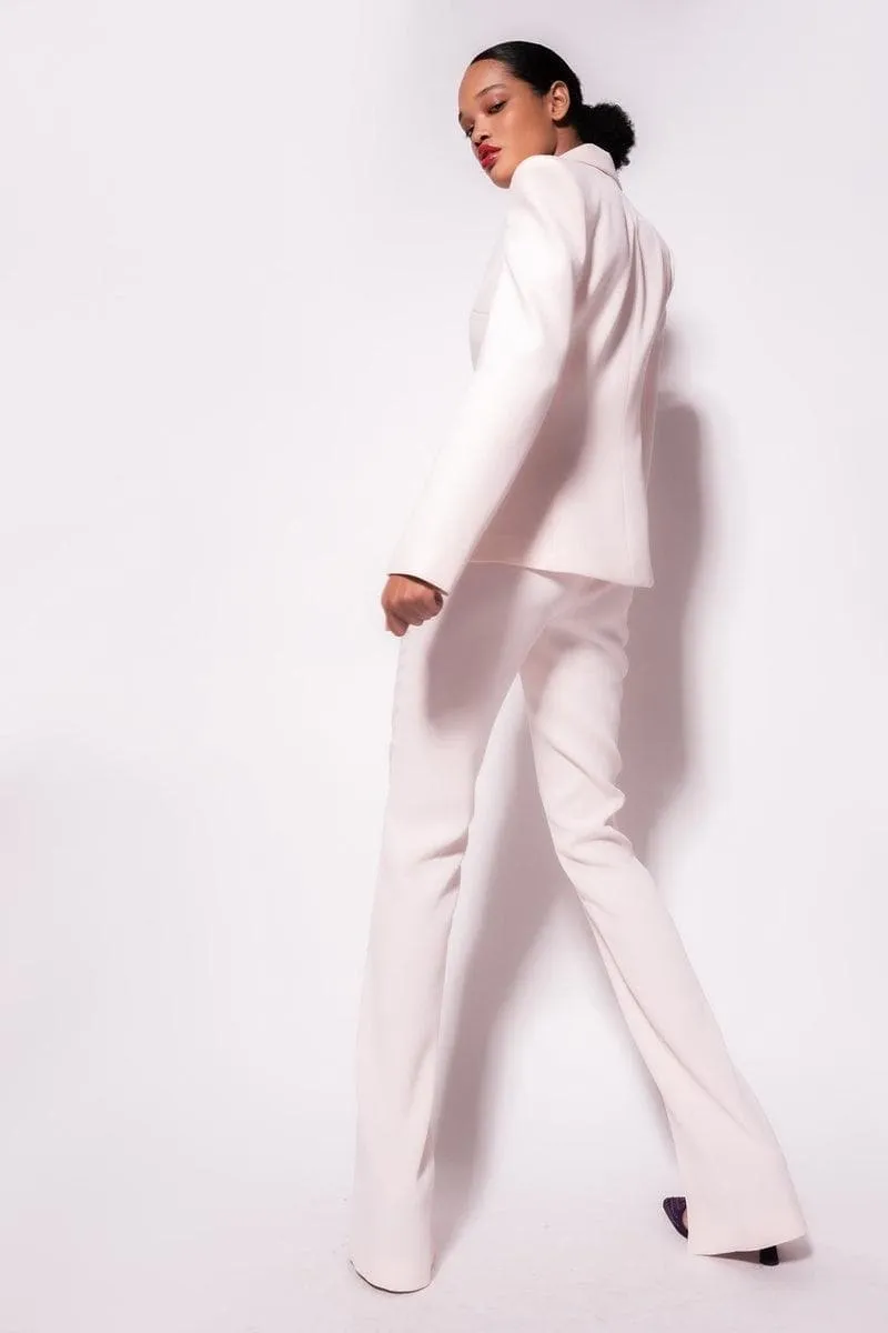 Pantaloni aderenti con spacco al fondo