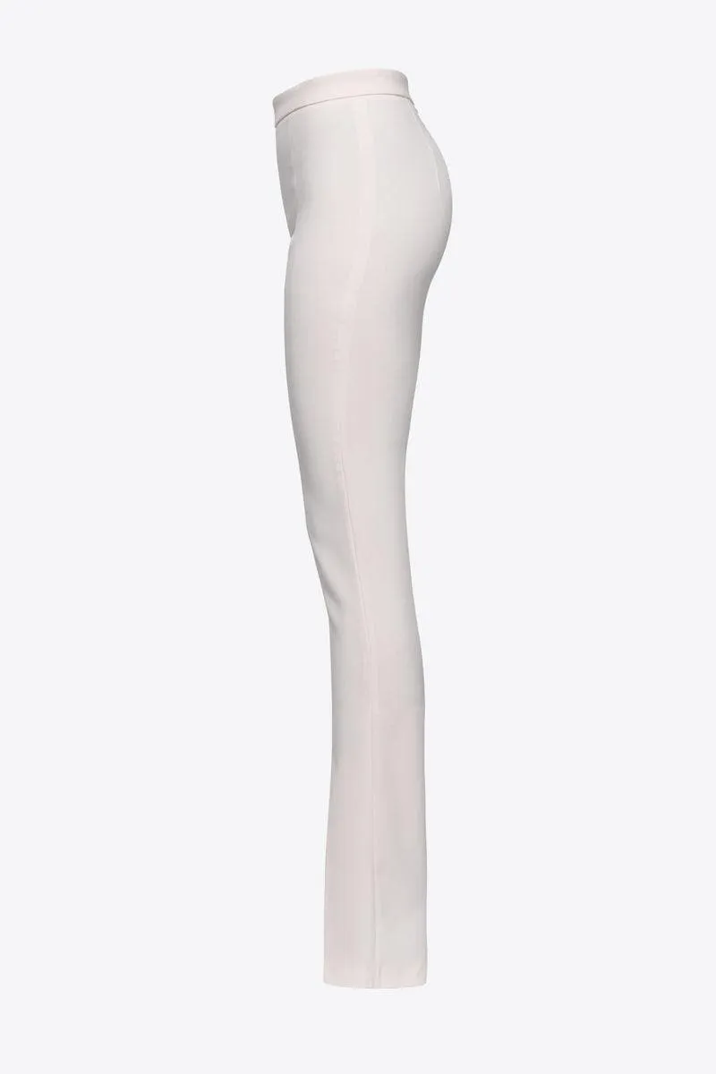 Pantaloni aderenti con spacco al fondo