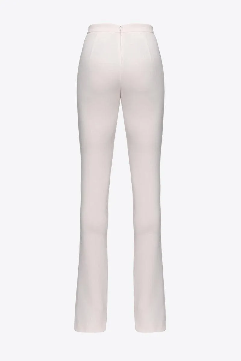 Pantaloni aderenti con spacco al fondo