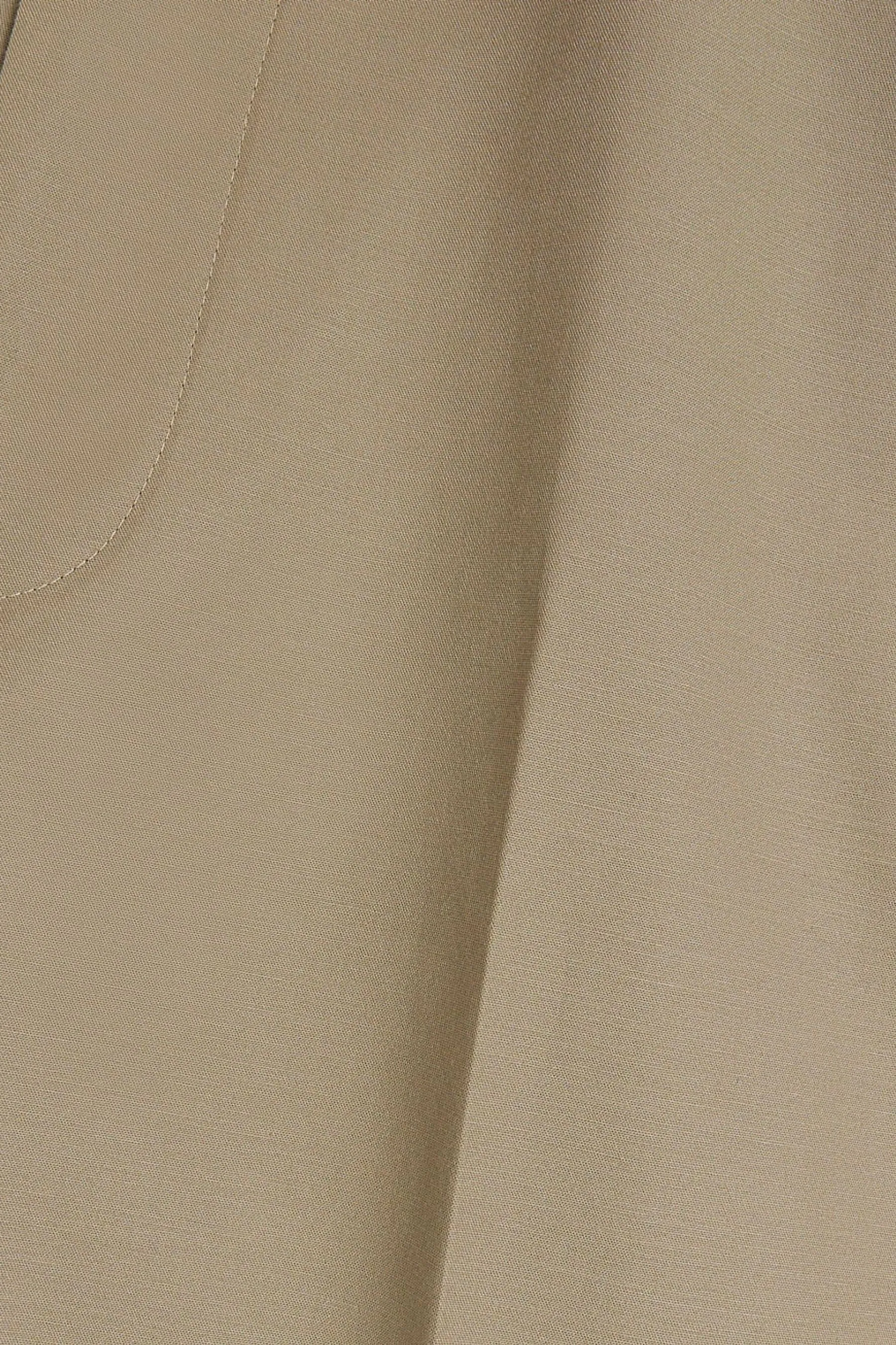 River Island - Pantaloni chino stretti in fondo con anelli per cintura